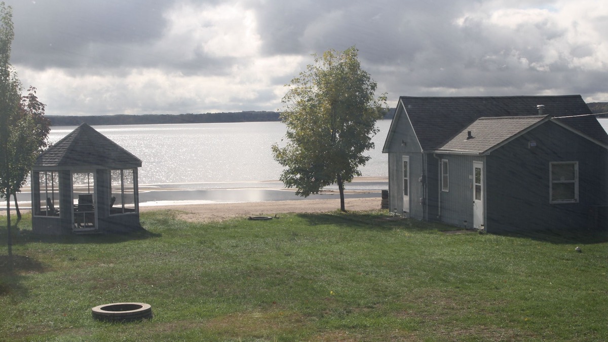 Shell Lake Cabin | The beach is calling.right outside your window. come relax and play!
