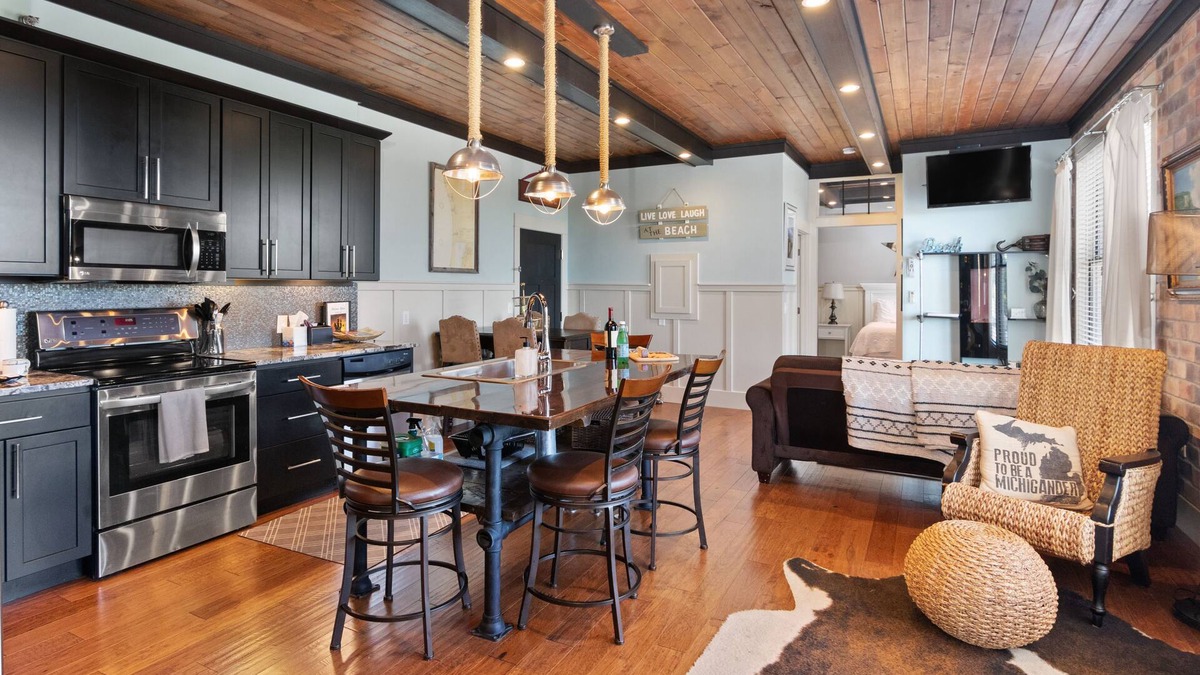 South Haven Condo | The Black Pearl: industrial condo sleeps 6, full size kitchen & scenic views!