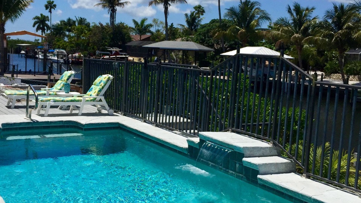 Matlacha Isles House | The Blue Lagoon With Heated Pool/on the Canal With NEW Boat Lift and Dock