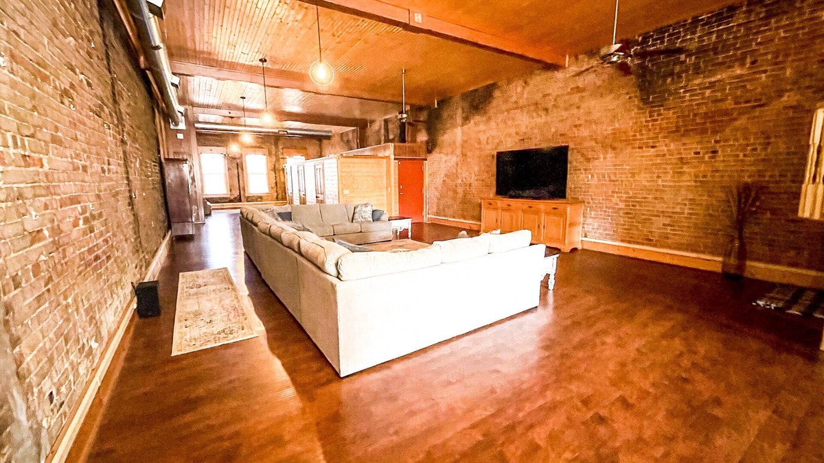 Nacogdoches Condo | The Brick Street Suite, high ceilings, historic brick street location