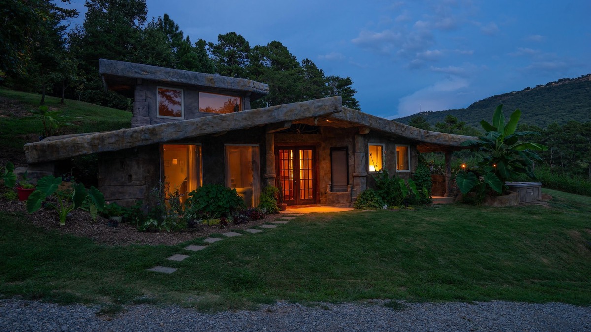 Wildwood Cottage | The Cavern on The Green. A unique hand-carved home. Quiet, great views
