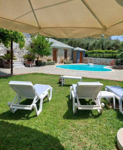 Koropi Villa | The Cocoon and olives Hut