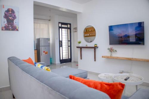 Riruta Apartment | The Cozy Nest with Pool, Gym and Netflix