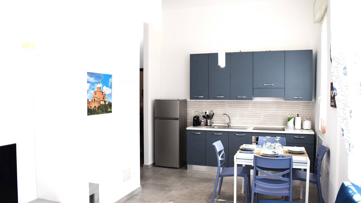 San Donato Apartment | THE DIMORA IN BLUE NEAR THE FAIR, UNIVERSITY, SANT'ORSOLA POLICY CENTER.