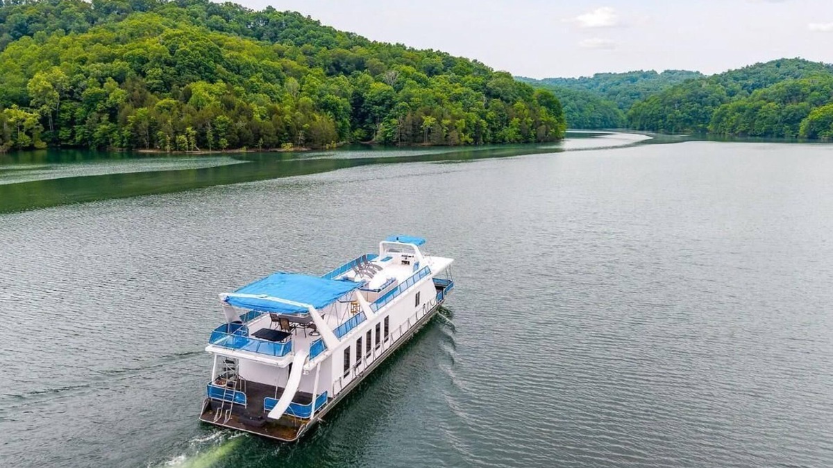 Allons Boat Rental | The Flagship Houseboat 84' - Largest Houseboat, 6 bedrooms,waterslide, fireplace on rooftop lounge area