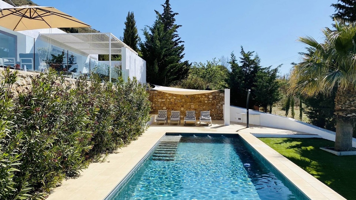 Carataunas House | The Glass House - An elegant, minimalist villa and pool with beautiful views.