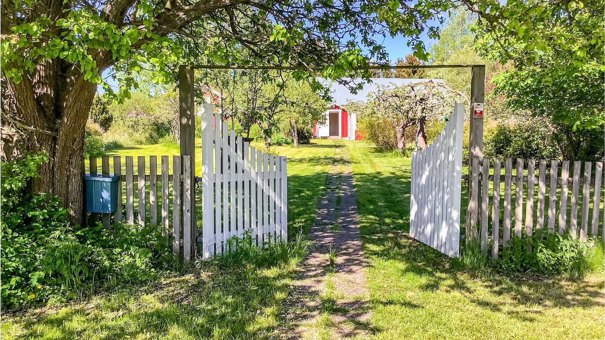 Balsta House | The house is last on the road with a few neighbors on one side and fields on the other.