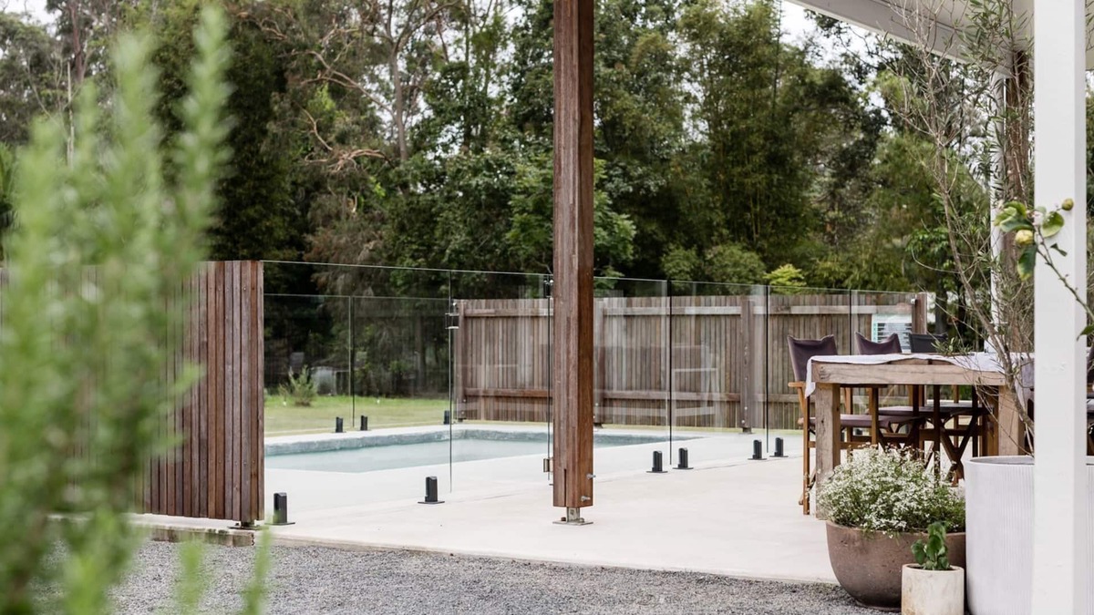 Lake Macdonald House | The Lake House - Escape the hustle and bustle and relax around the pool.