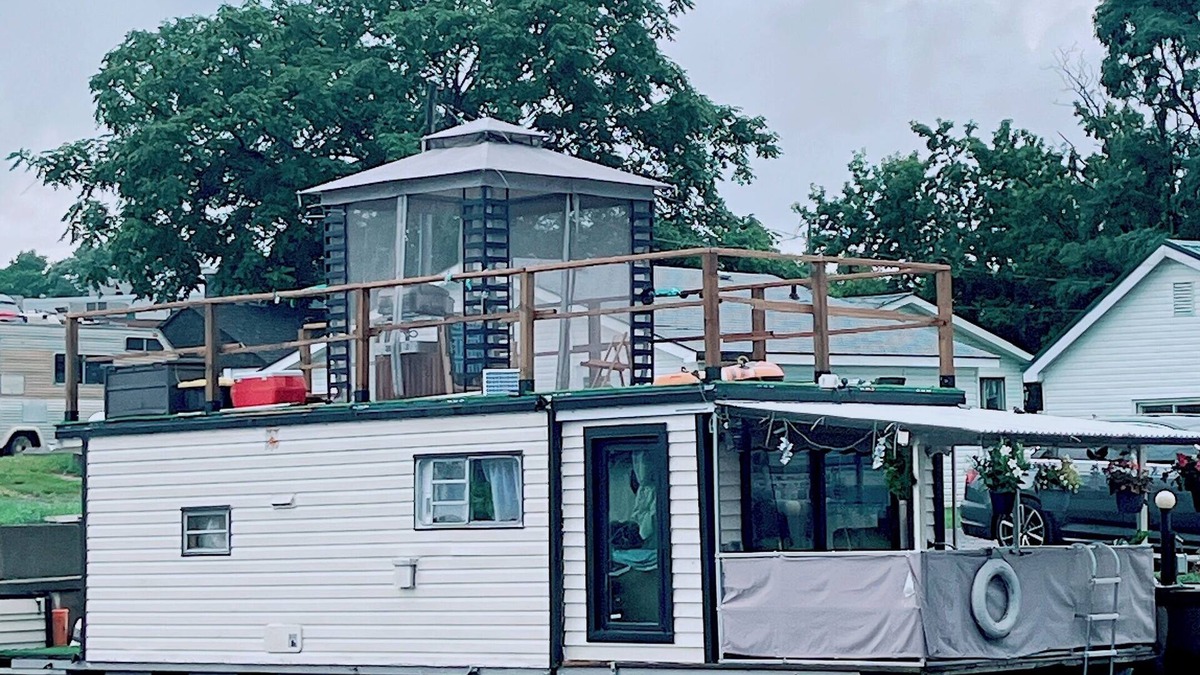 Belleville Boat Rental | The Lilypad: PEC Retreat Waterfront Houseboat Experience Fishing & Glamping