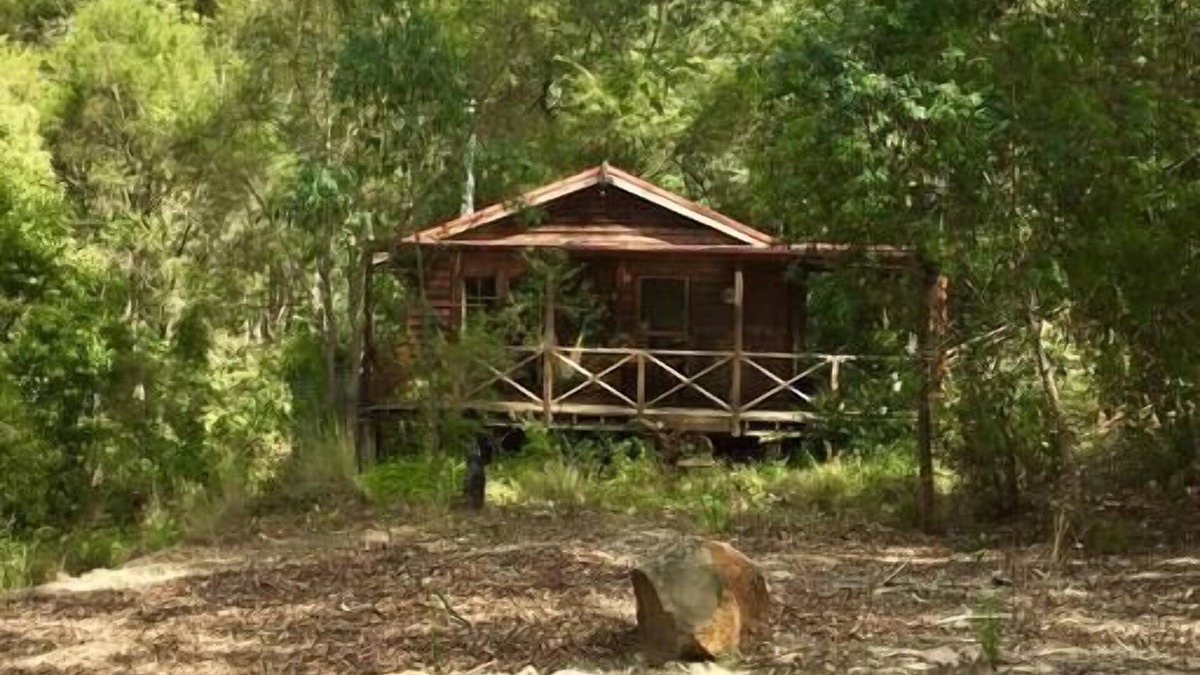 Bandon Grove Cabin | The Lilypond - a beautiful escape with log fire & spa bath surrounded by nature.