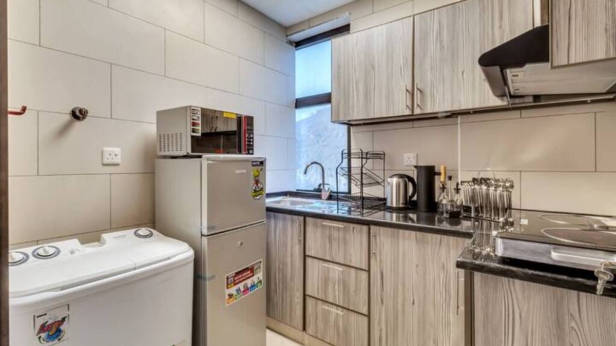 Falaj al Moalla Apartment | The Living
