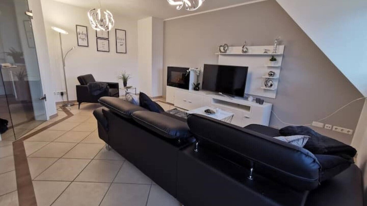 Bad Essen Apartment | The modern Welness apartment is located in Bad Essen with a view of the Wiehengebirge mountains.