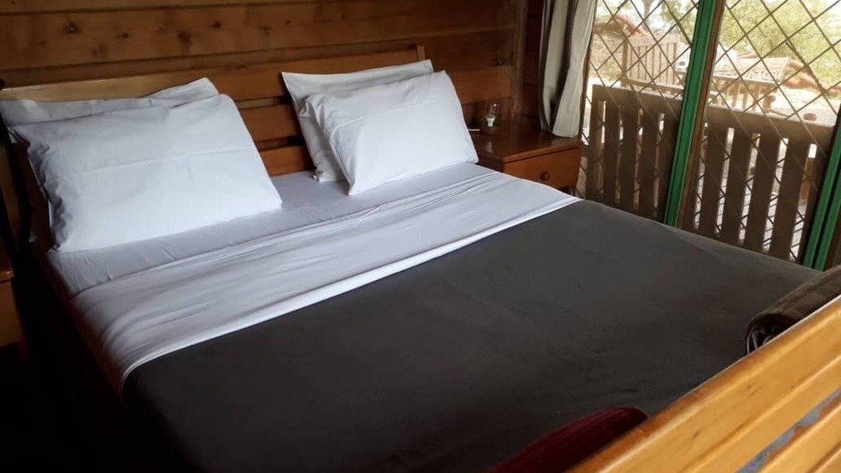 Western Region Ski Chalet | The Observatory Lodge at Kichwamba escarpment overlooking Queen Elizabeth NP.