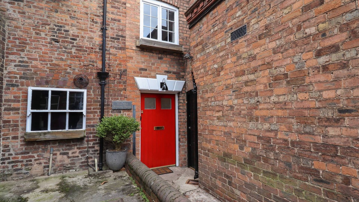 Hawarden Cottage | THE OLD SORTING OFFICE, pet friendly, with hot tub in Hawarden
