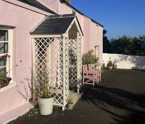 Carrickfergus Apartment | The Pink Cottage upstairs suite & Garden Summer Room