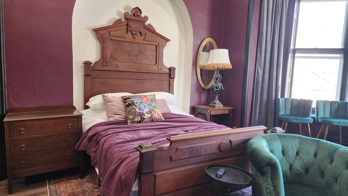 Akron Apartment | The Plum Parlor - Moody Victorian Studio with Timeless Charm