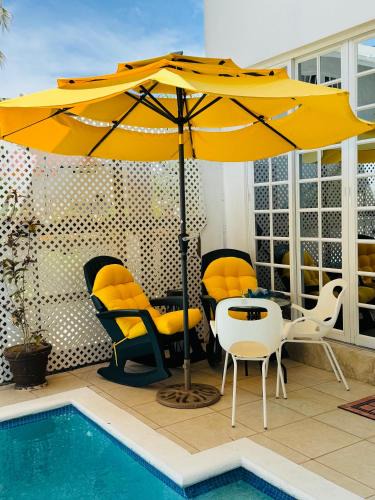 Bon Accord Village House | The PoolSide Pad- 5 mins from Airport & Beaches