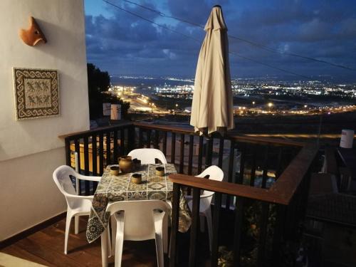 Haifa Apartment | The Potter's House overlooking the Bay of Haifa
