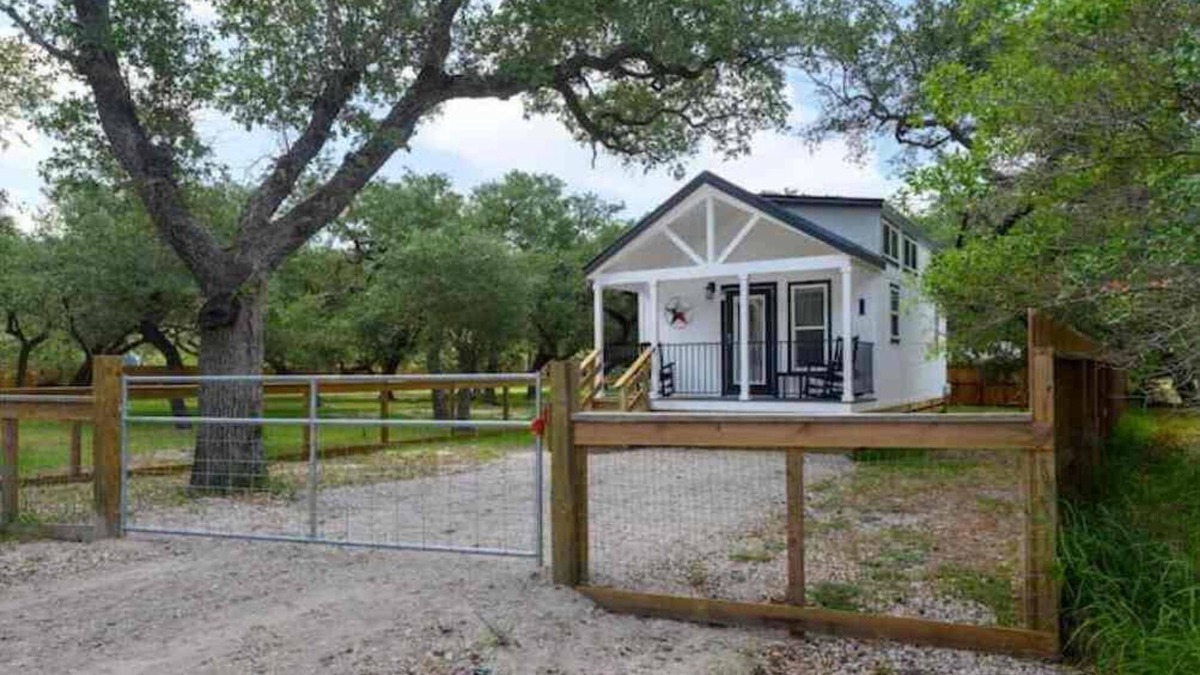 Rockport Cottage | The Rattle Trap Tiny house fenced yard