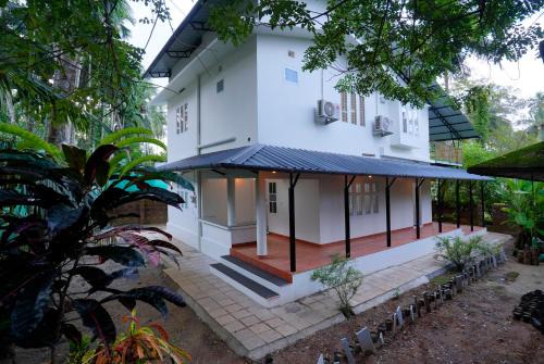 Kozhikode House | The Riverside Guesthouse