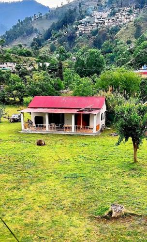 Balakot Resort | The Round Bed Cottage At Country Club Balakot