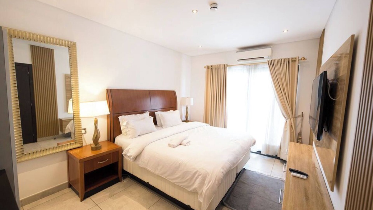 Accra Apartment | The Signature Apartment Unit A407-Charming 2-bedroom in Accra with AC, Free WiFi