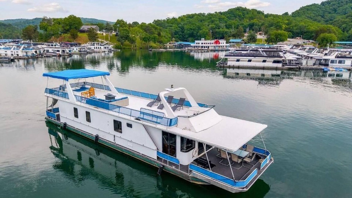 Allons Boat Rental | The Stillwater Houseboat 75' - Medium Houseboat, 6 bedrooms,waterslide, fireplace on rooftop lounge area