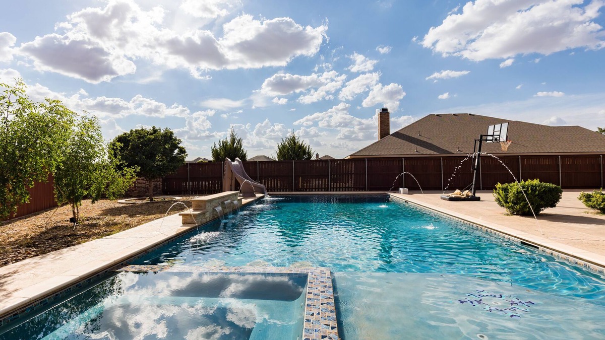 Lubbock House | The ultimate resort ranch style pool home on nearly a half acre!