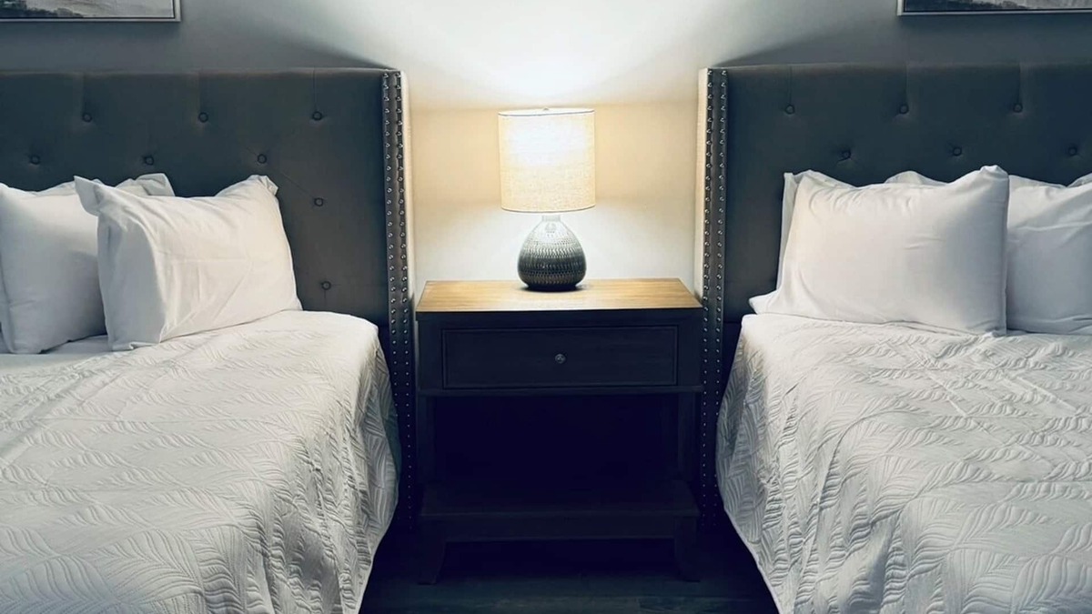 Wellston Hotel | The Woods Suite #301 Free Arcade, Movie Theater, Patio Area, Playground and more