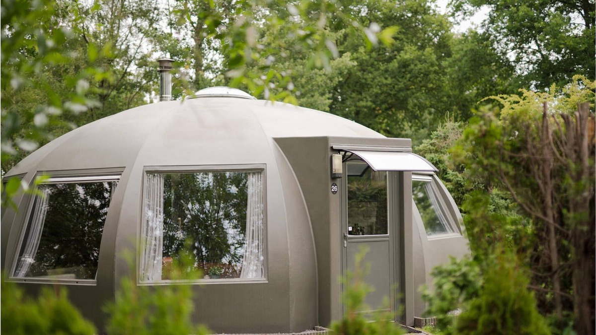 Municipality of Alphen-Chaam House | These detached bungalows with domed roofs are scattered in a wooded resort.