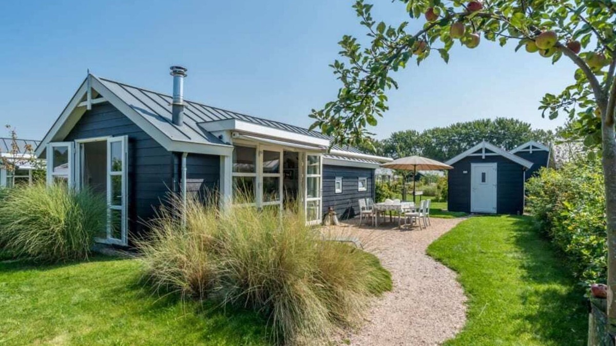 Westenschouwen House | This chalet has an extra spacious living room and two sitting areas, one of which is situated by the