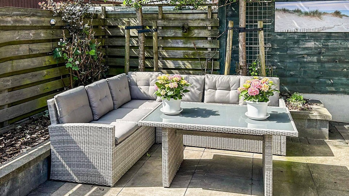 Woudsend House | This charming vacation home in Woudsend is located next to an old windmill.
