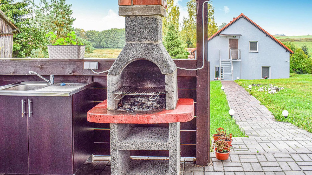 Biskupiec Apartment | This cozy vacation apartment is located in the Polish village of Najdymowo.