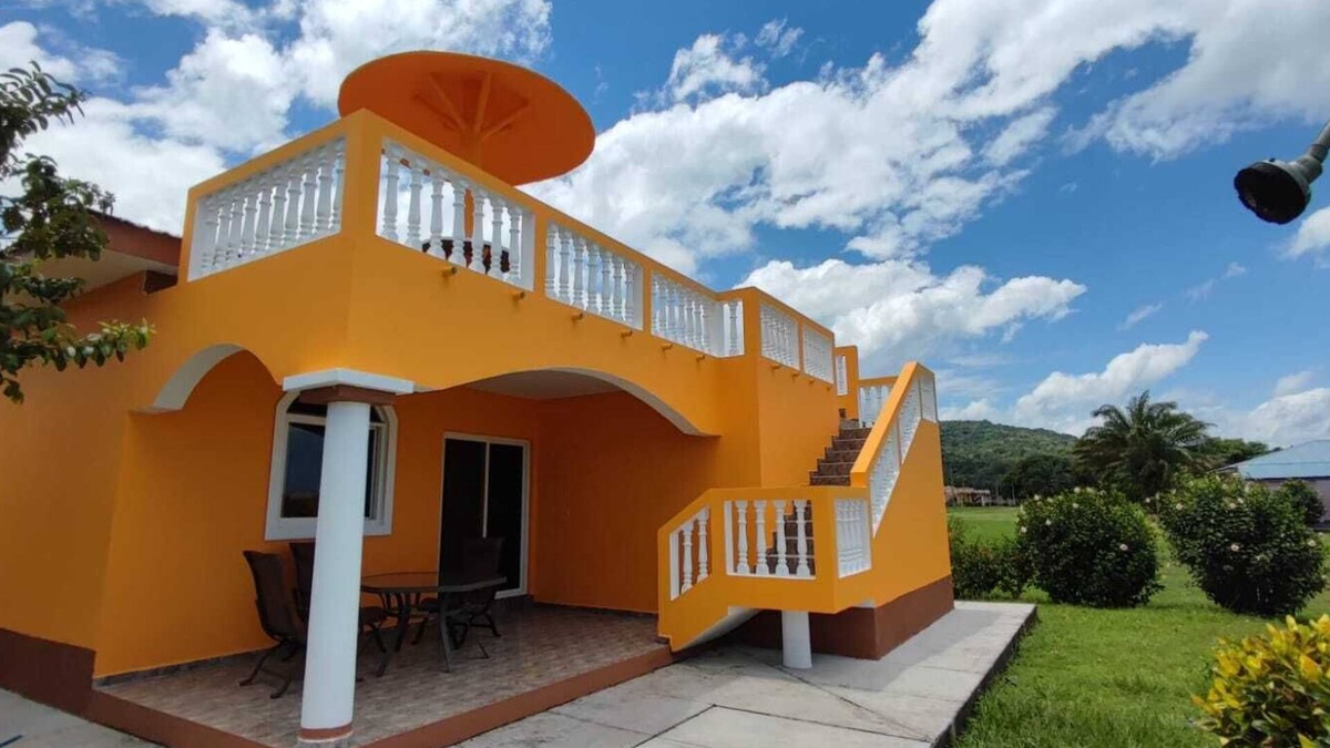 Colon House | This Hidden paradise located right on the Caribbean Ocean & big tall Mountains.