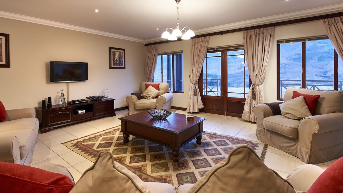 Clarens House | This holiday home has a balcony, stove top and kitchen