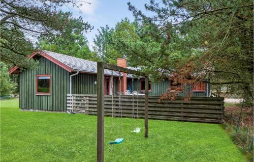 Blavand House | Three-Bedroom Holiday Home Blåvand With A Fireplace 05