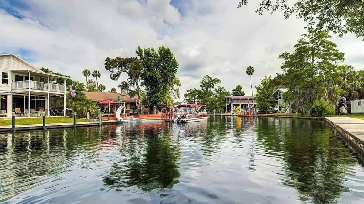 Weeki Wachee Gardens House | Tiki Tropical Retreat - directly on the clear Weeki Wachee River (not a canal)