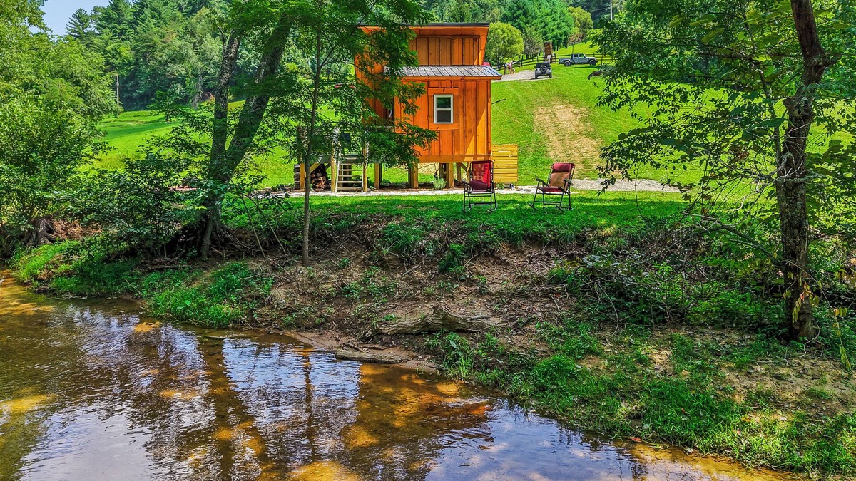 Hillsville Cabin | Tiny cabin sits by the bubbling, stocked creek. Pet friendly