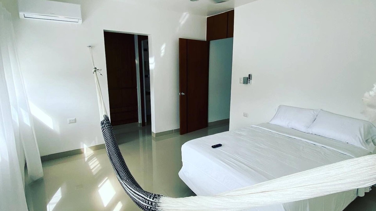 Tizimin House | Tizimín retreat: stylish townhouses, natural harmony, modern comforts.