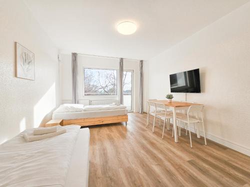 Heiligenhaus Apartment | Tolstov Apartments - Monteurwohnungen - 2 Schlafzimmer - Küche - Balkon - Waschmaschine - 25 Min zur Messe DUS