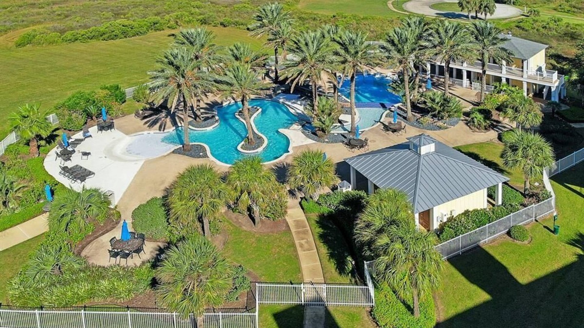 Galveston Condo | Top floor condo looking out at West Bay and the heated Sunset Pool/Lazy River!
