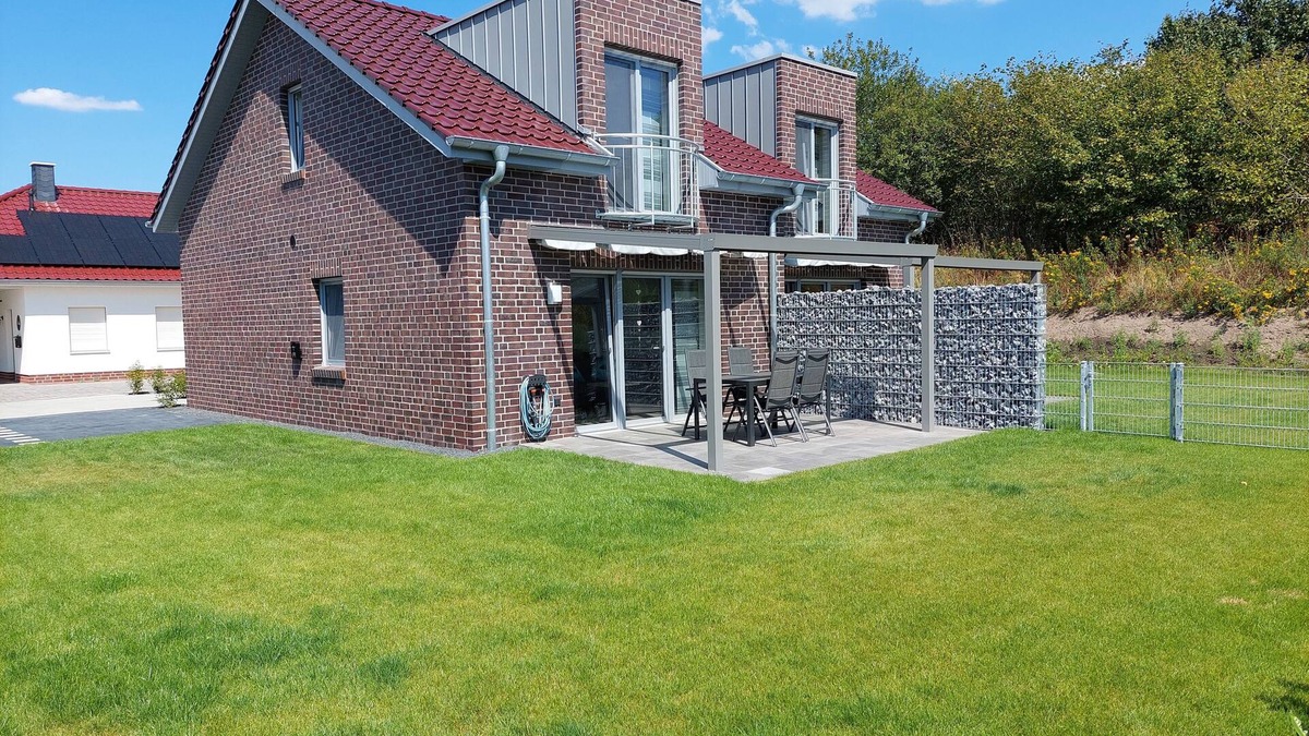 Geeste Apartment | TOP! New build - High-quality and modern DHH, wallbox, electric fireplace, WLAN, close to the lake