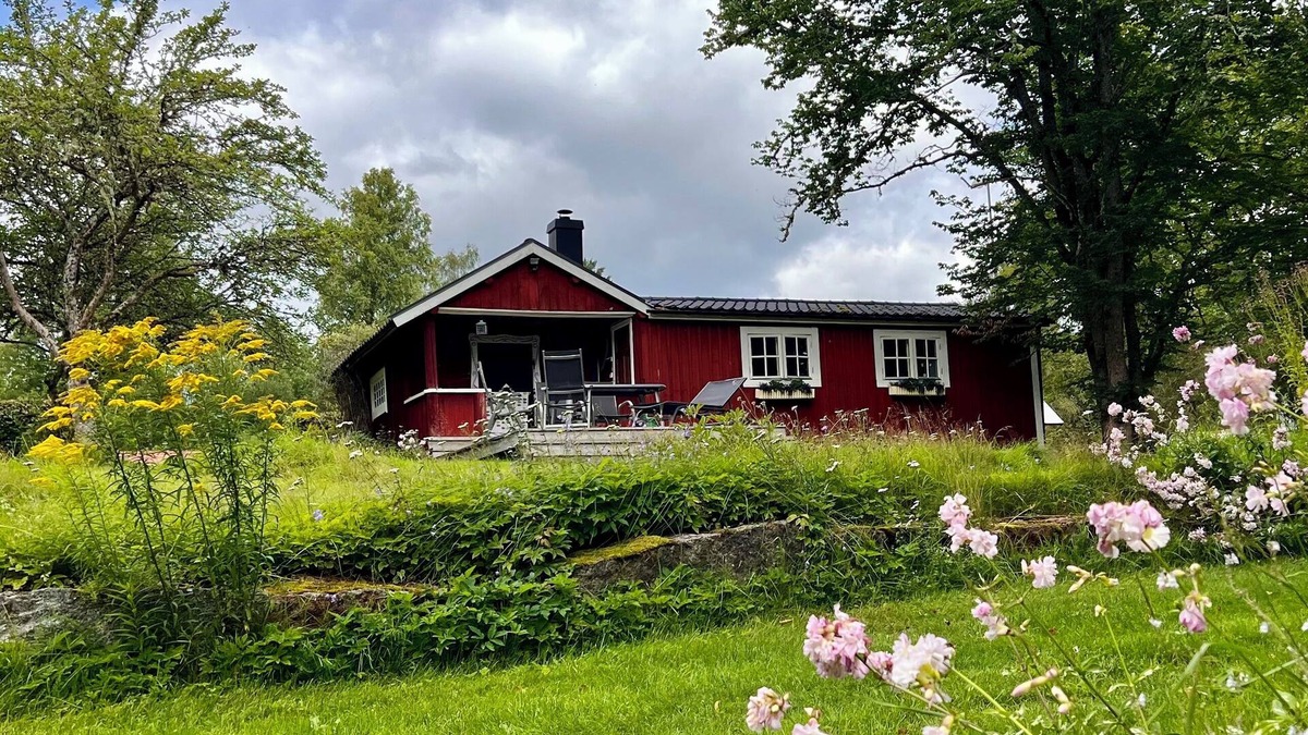 Adelfors House | Top renovated red vacation home in Ädelfors by the river Emån, in Småland.