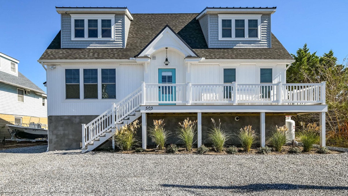 Fenwick Island House | Top Reviewed 5 BD, 3 BA Spacious Canal-front Cottage with 2+ block walk to beach