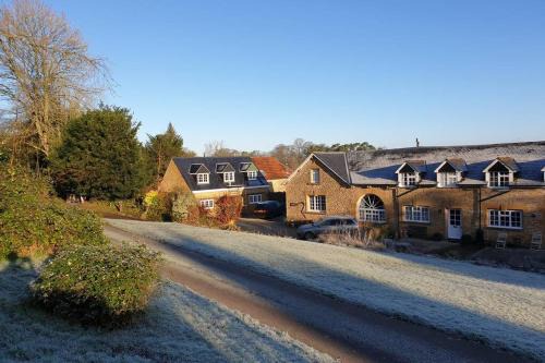 East Coker House | Traditional coach house in rural private estate.