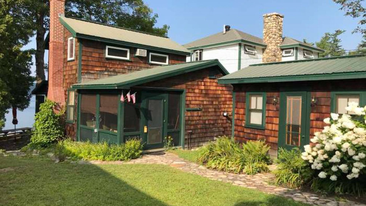 Raymond Cottage | Tranquil cottage near beach with private dock, spacious patio & modern comforts