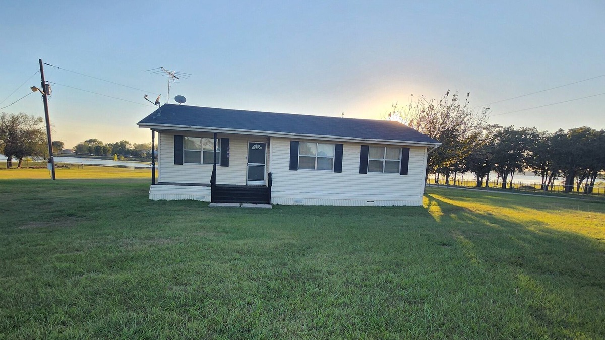 Eastland House | Tranquil Lake House on 2 Acres: Pet-Friendly with Stunning Lake Views.