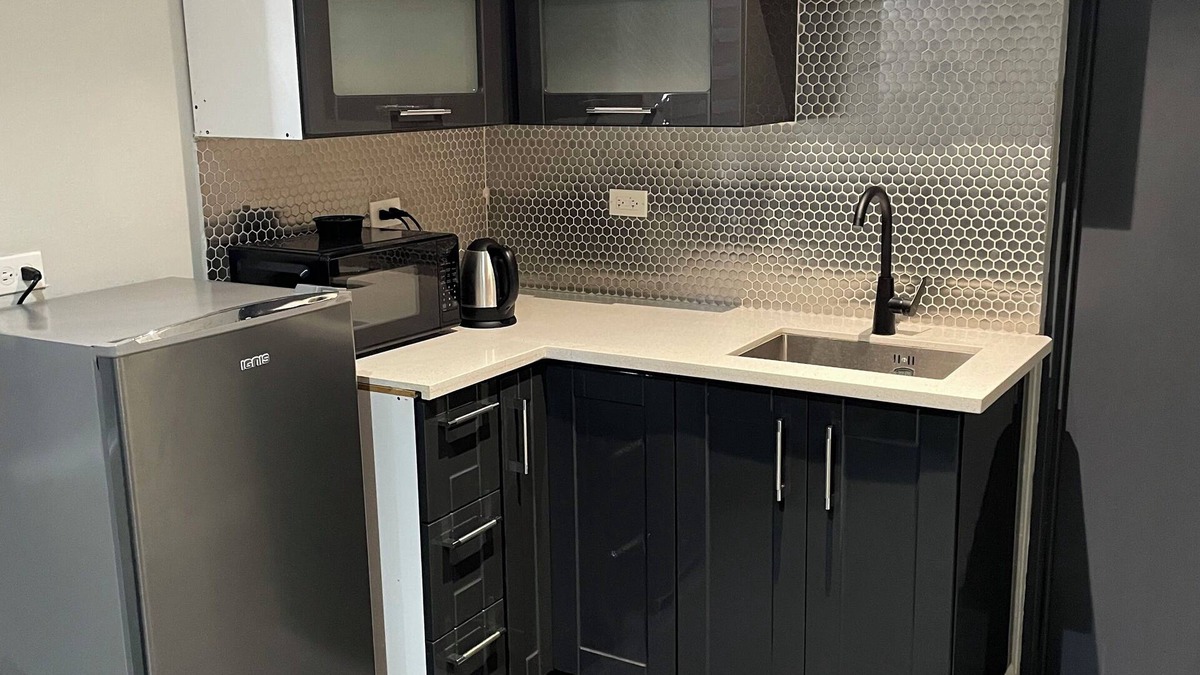 Downtown Apartment | Tranquility Hotel Suite RB, walking distance to the QPS, Ariapita Ave, & EV Zoo,