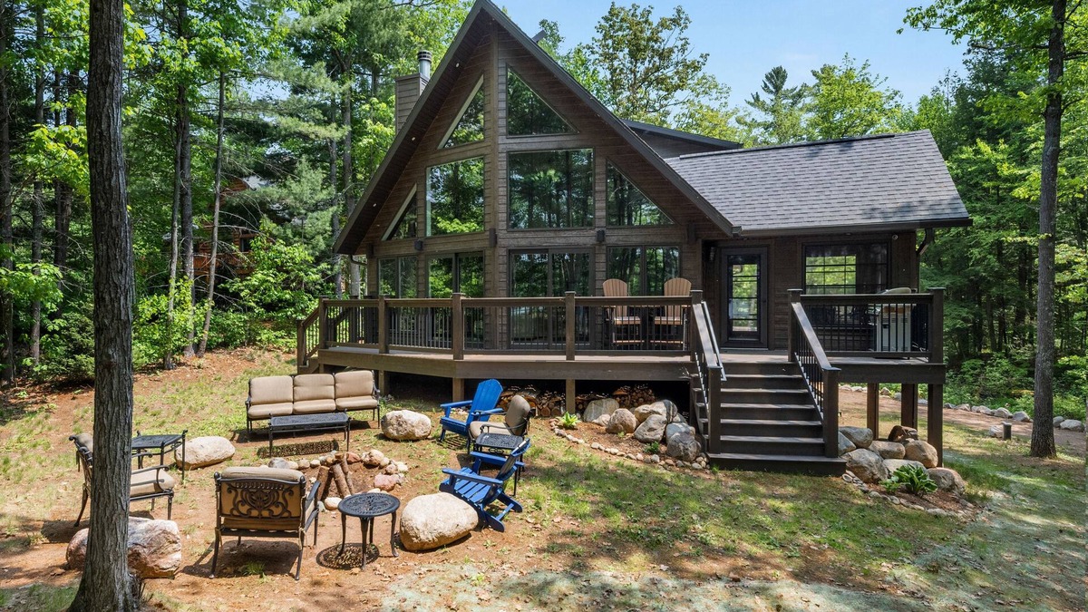 Lac du Flambeau House | Tranquility Point | LUX lakefront retreat, private dock, firepit, kayak, & AC