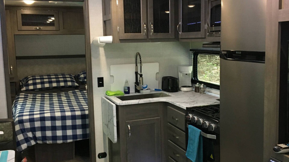 Norway House | Travel Trailer in the woods